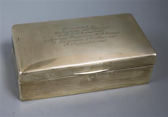 A George V silver mounted presentation cigarette box, 20.5cm